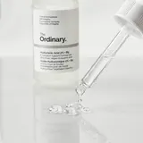 	The Ordinary Hyaluronic Acid 2% + B5 serum clear droplets on glass surface