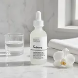 The Ordinary Hyaluronic Acid 2% + B5 Ceramides on white marble vanity