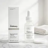 The Ordinary Niacinamide 10% + Zinc 1% Serum on white marble vanity