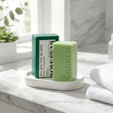 Some By Mi AHA BHA PHA Miracle Cleansing Bar on marble bathroom shelf
