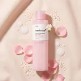 Medicube PDRN Pink Milky Toner with rice grains and pink petals