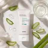 COSRX Aloe Tone-Up Sunscreen with fresh aloe leaves and clear gel