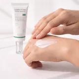 Applying AXIS-Y Physical Sunscreen on back of hand - no white cast mineral texture