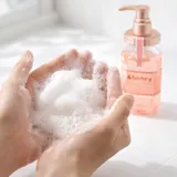Hands lathering &Honey Melty Moist Repair Shampoo into rich foam