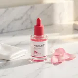 Medicube TXA Niacinamide 15 Serum on white marble vanity