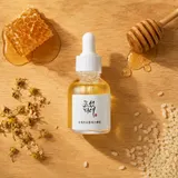 Beauty of Joseon Glow Serum with honeycomb and propolis on wooden surface