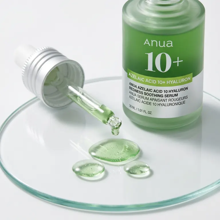 ANUA Azelaic Acid Serum green silky droplets on glass surface