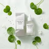 Skin1004 Centella Brightening Ampoule with centella leaves and white capsules
