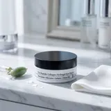COSRX Peptide Collagen Hydrogel Eye Patch jar on white marble vanity